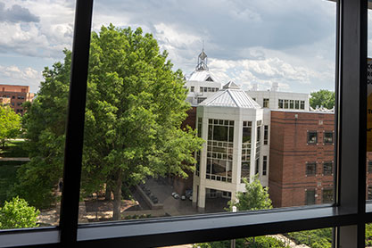 A view of a building through a window. Link to Life Stage Gift Planner Ages 45-65 Situations.