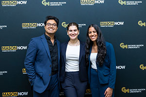 Three people smiling