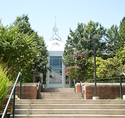 Stairs leading to a GMU building. Links to Gifts of Real Estate