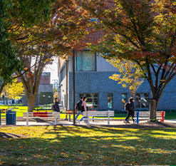Students walking on campus. Links to Donor-Advised Fund story